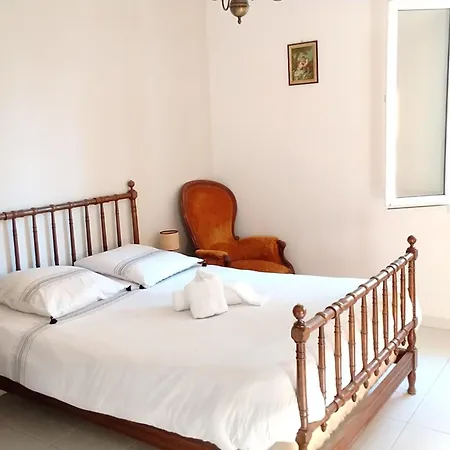 House With Garden Near The Sea In *